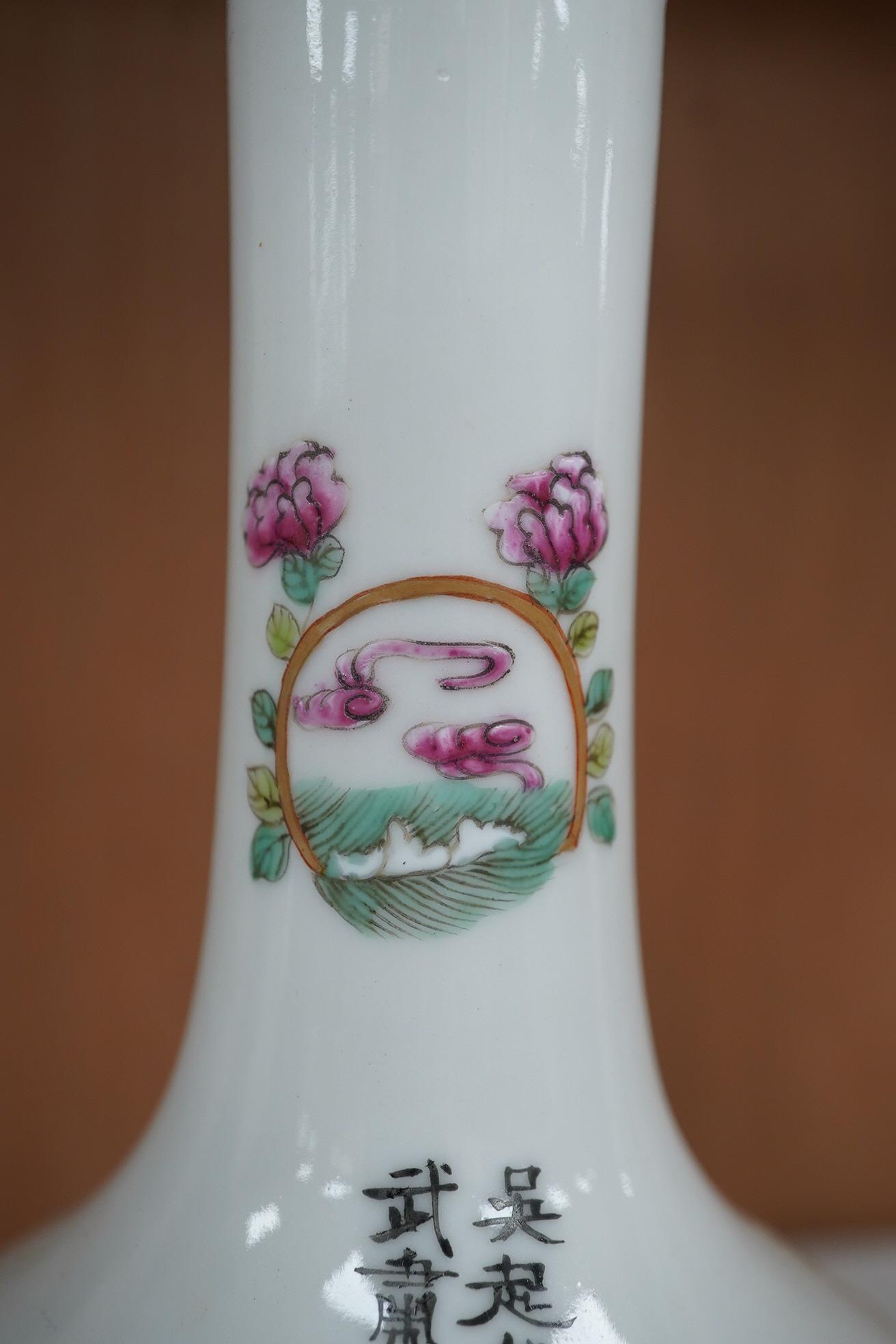 A Chinese famille rose bottle vase, 20cm. Condition - good